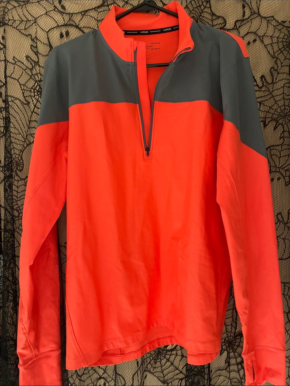 Under Armor Men’s Half-Zip Pullover in Bright Coral and Charcoal